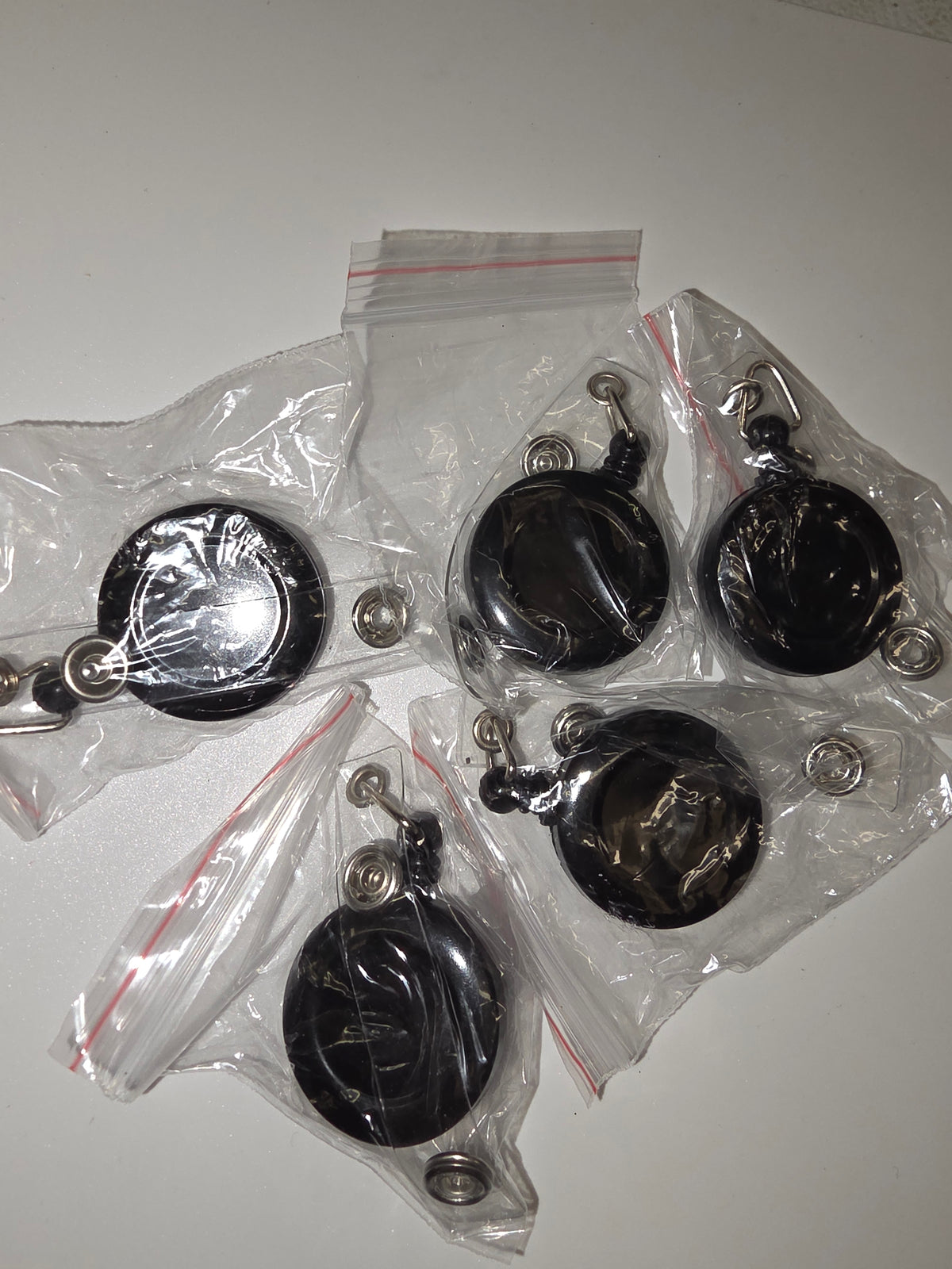 5 Pack Black Badge Reels
